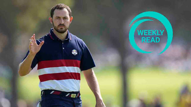 United States' Patrick Cantlay reacts to the crowd on the 1st green during their singles match at the Ryder Cup golf tournament at the Marco Simone Golf Club in Guidonia Montecelio, Italy, Sunday, Oct. 1, 2023, along with the Weekly Read logo.